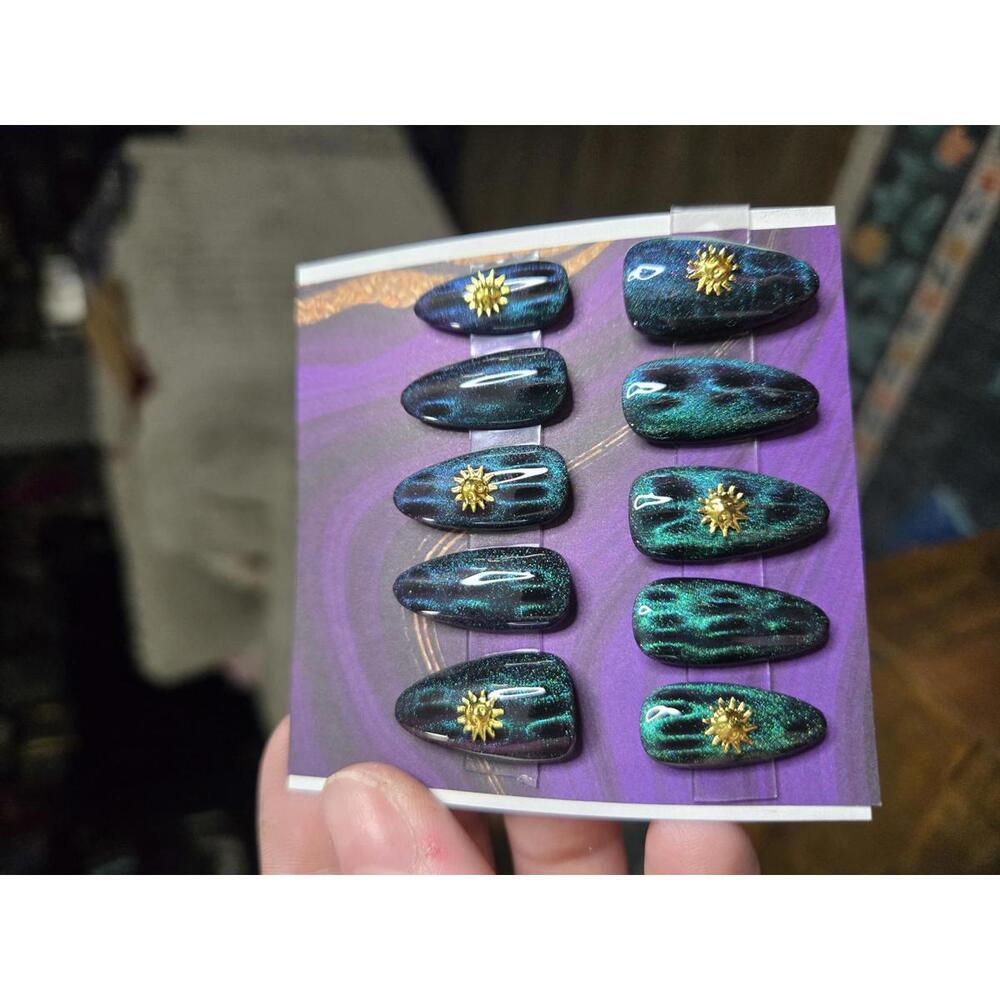 Almond green cat eye and sun nails custom made